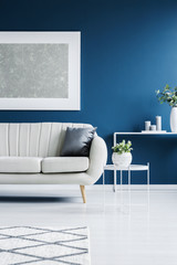 Leather couch and big painting