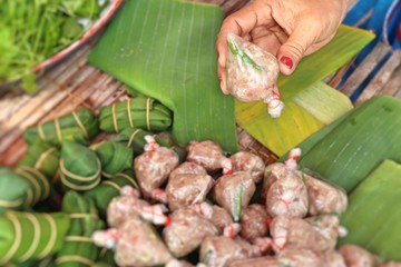 Pork wrapped in banana leaves