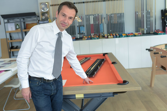 playing billiards at red pool table