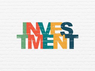 Finance concept: Painted multicolor text Investment on White Brick wall background