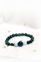lapis lazuli bead and Labradorite Crystal lucky stone bracelet bead on white towel...