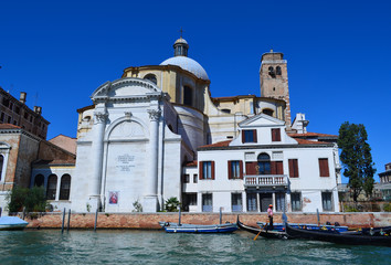 Fototapeta na wymiar Ancient buildings along Canal Grande in Venice, Italy