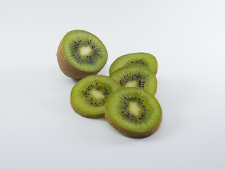Slice of kiwi fruit isolated on white background.