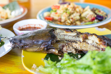 Thailand street food market, fish grilled. Business street food, fish.