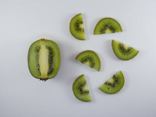 Slice of kiwi fruit isolated on white background.