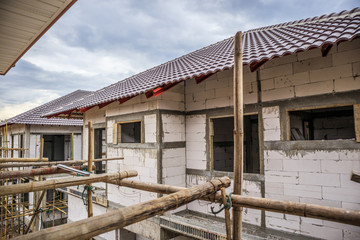 construction residential new house in progress at building site
