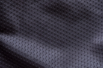 Fototapeta na wymiar Black fabric sport clothing football jersey texture background