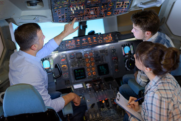 Students in cockpit simulator