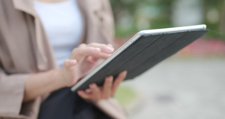 Woman using tablet computer