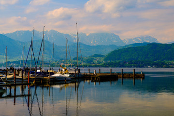 Fototapeta na wymiar View on harbor in city Gmunden and mountains