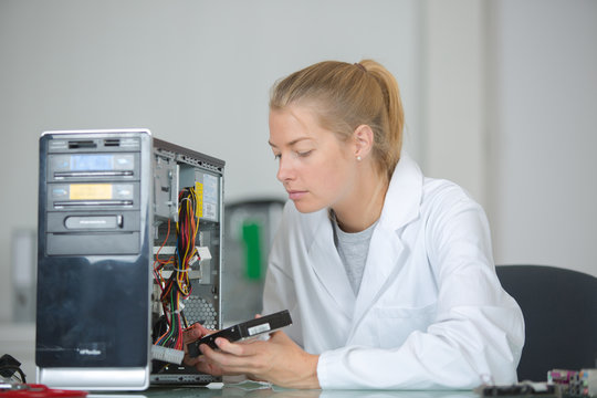 Lady repairing computer