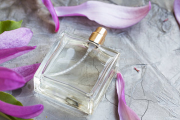 Bottle of Perfume with magnolia flowers