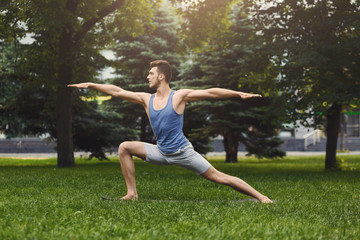 Obraz na płótnie Canvas Fitness man warm up stretching training outdoors