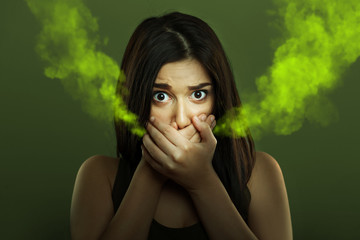 Halitosis concept of woman with bad breath - obrazy, fototapety, plakaty