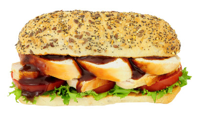 Chunky chicken and salad sandwich isolated on a white background
