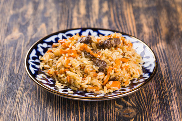 Traditional oriental pilaf. Central Asian cuisine.