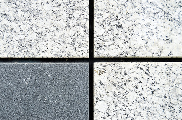 Front wall surface, gray granite in orthogonal composition, architectural textures and background