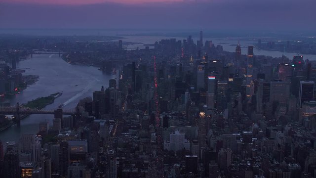 Midtown NYC aerial at twilight, East Side, Uptown looking midtown and downtown 