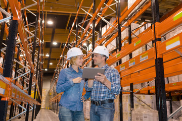 Fototapeta premium two workers at warehouse