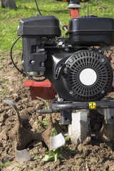 Agricultural machinery. Cultivator for loosening soil in the garden.