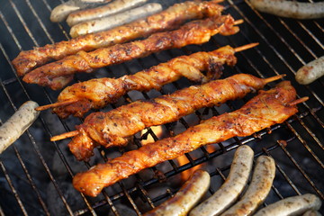 Sausages barbecue with a charcoal barbecue in the garden



