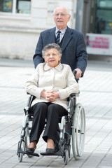 Fototapeta na wymiar senior couple in wheelchair