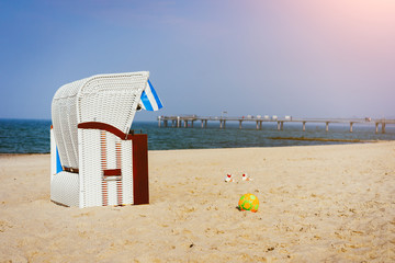 One Beach Chairs on sandy beach on Travemuende, Luebeck Bay, Germany