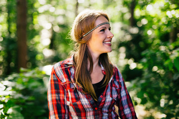 Beautiful woman smiling in forest