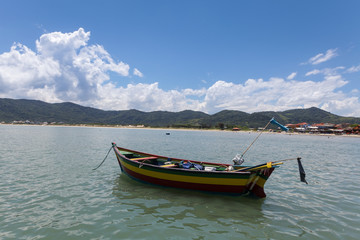 Fototapeta na wymiar Traditional boat in the sea on sunny summer day.