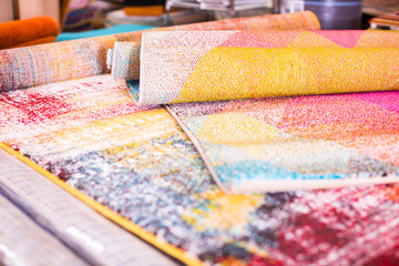Fototapeta premium Image of traditional woolen carpets at carpet market