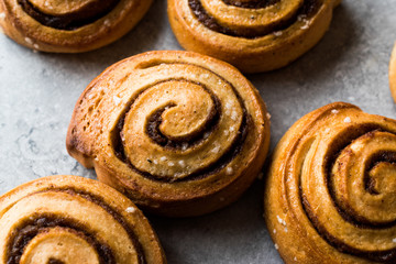 Chef Ready to Serve New York Steak with Shallot Onions and Vegetables at Restaurant Kitchen.