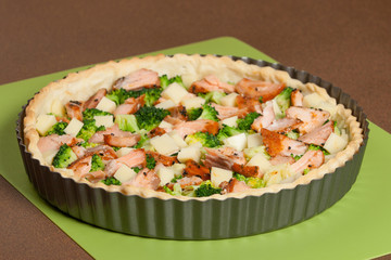 Cooking Process Of Salmon Quiche With Broccoli. Traditional British Food.