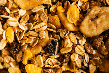 Macro view of muesli with dried banana and raisin