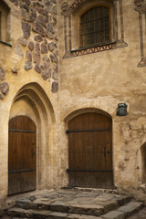 Fototapeta na wymiar Windows, doors and walls of the castle 