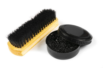 shoe brush and black wax on a white background, isolate