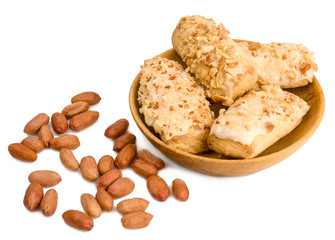 peanuts and biscuits with peanuts, isolated on white