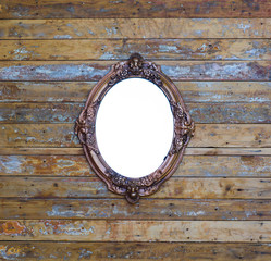 Victorian decorative vintage elegant mirror on a wooden background