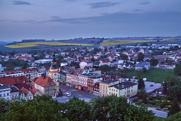 Obraz premium Bird's eye view of the town hall and evening market in Otmuchow.