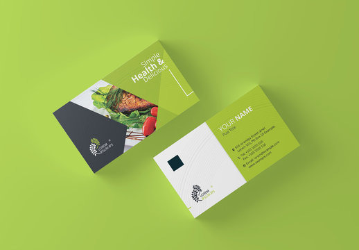 Business Card Layout with Green Accents