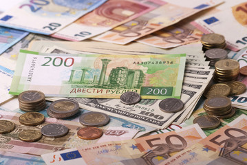 Dollar, euro, ruble banknotes, coins