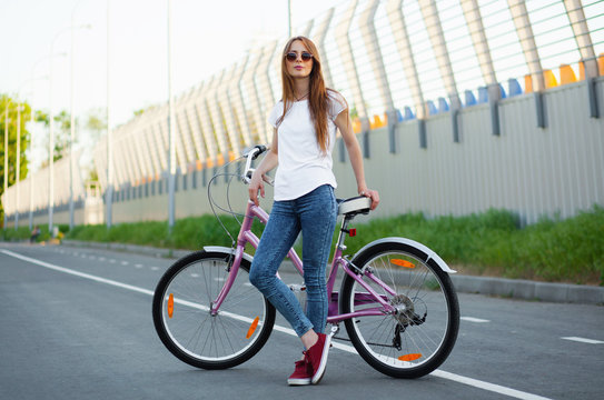 Beautiful woman with a bicycle