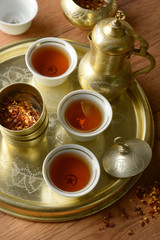 Obraz na płótnie Canvas turkish tea service on wooden table