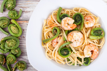 garlic linguini with shrimp and fiddlehead fern