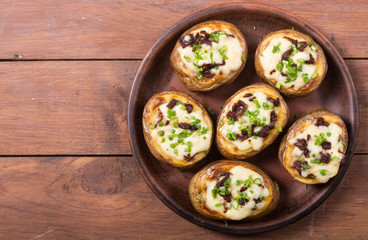 Baked potato stuffed with cheese