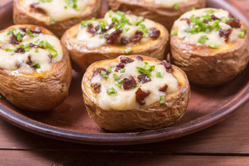 Baked potato stuffed with cheese