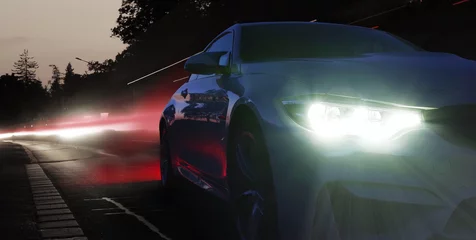 Selbstklebende Fototapete Schnelle Autos Scheinwerfer eines Sportwagens in der Nacht 