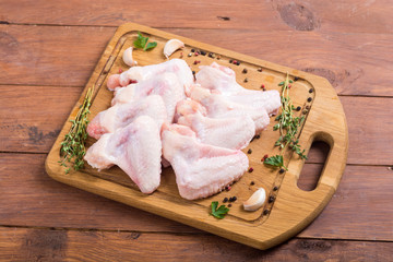 Raw chicken wings with spices