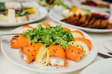 Beautifully decorated catering banquet table with different food