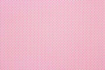 pink polka dots pattern background, top view
