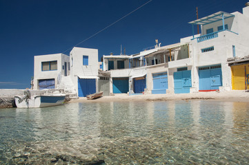 Syrmata fisherman houses of Firopotamos at Milos island in Greece